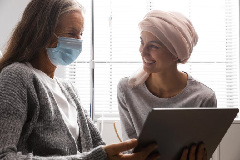 female-patients-talking-hospital-indoors